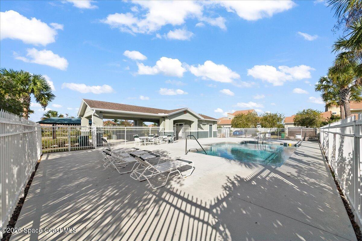 4938 Sprint Circle Rockledge, FL 32955 - Photo 11 of 37 a view of roof deck with dining table and chairs