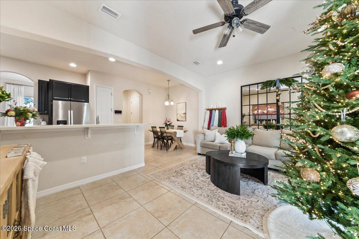 4938 Sprint Circle Rockledge, FL 32955 - Photo 37 of 37 a living room with furniture and a potted plant