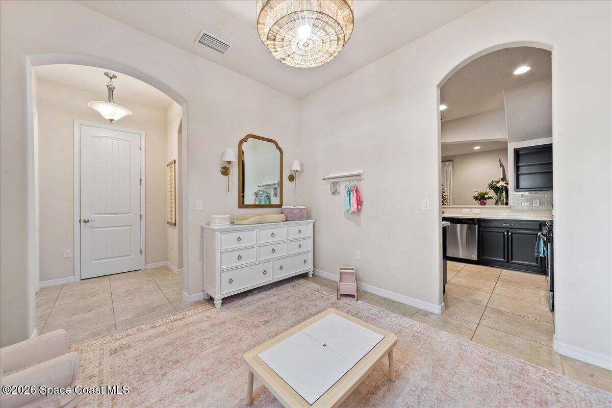 4938 Sprint Circle Rockledge, FL 32955 - Photo 23 of 37 a view of a hallway with cabinet