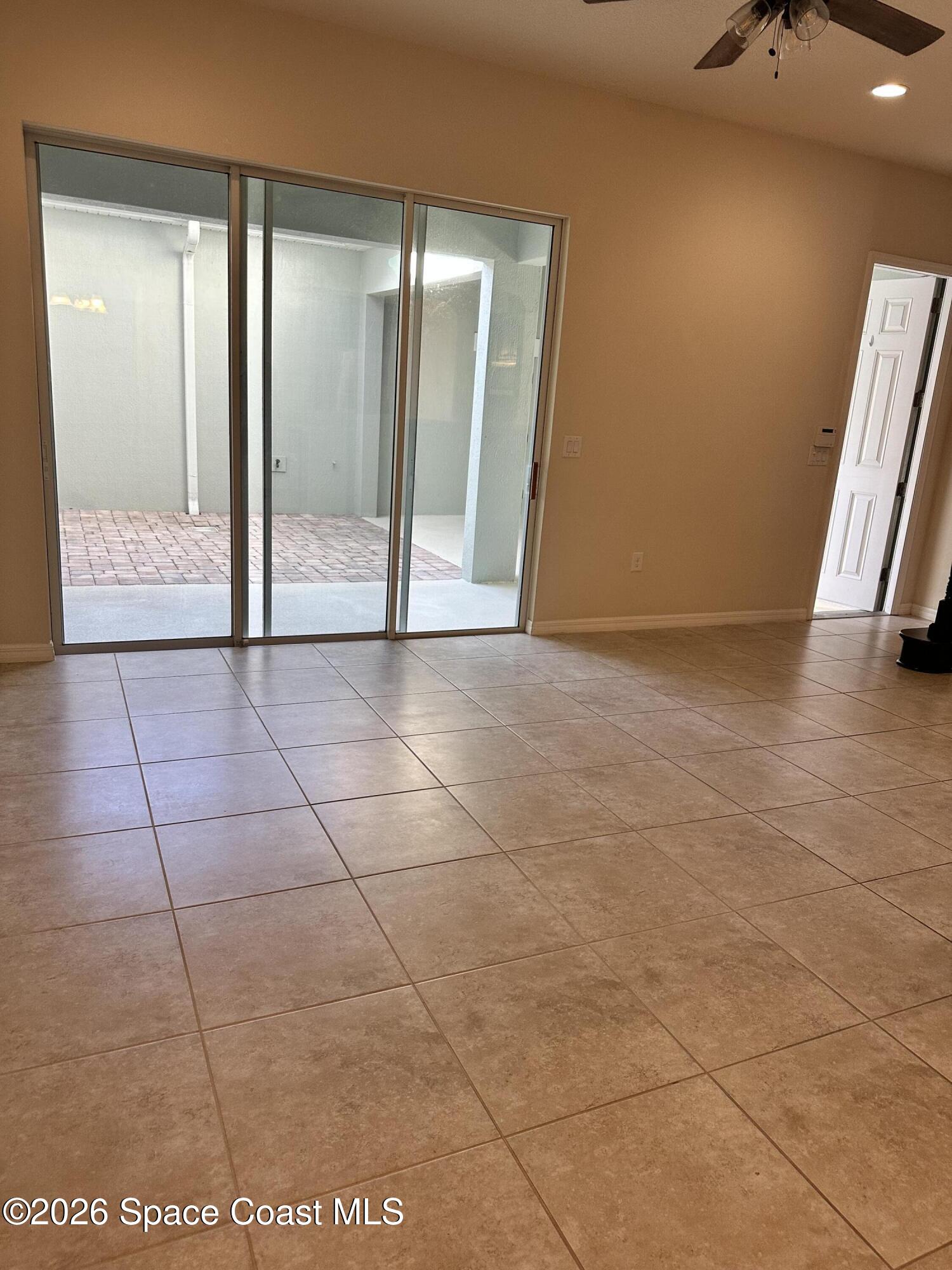 4938 Sprint Circle Rockledge, FL 32955 - Photo 32 of 37 a view of an empty room with a bathroom