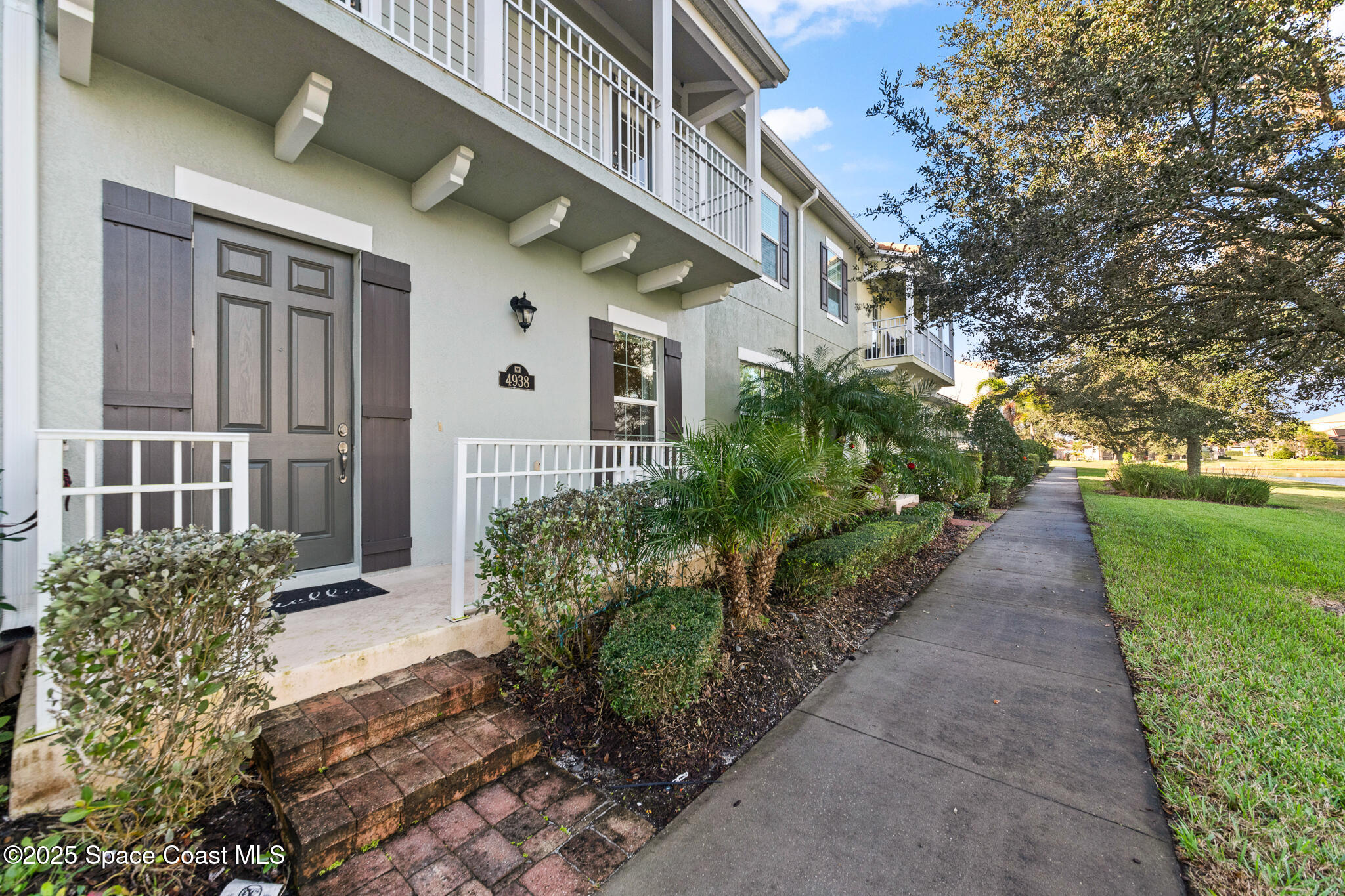 4938 Sprint Circle Rockledge, FL 32955 - Photo 5 of 37 Front View with Sidewalk