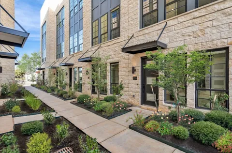 a view of a building with a potted plants