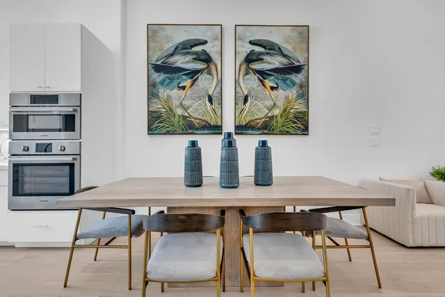 a view of a workspace with furniture