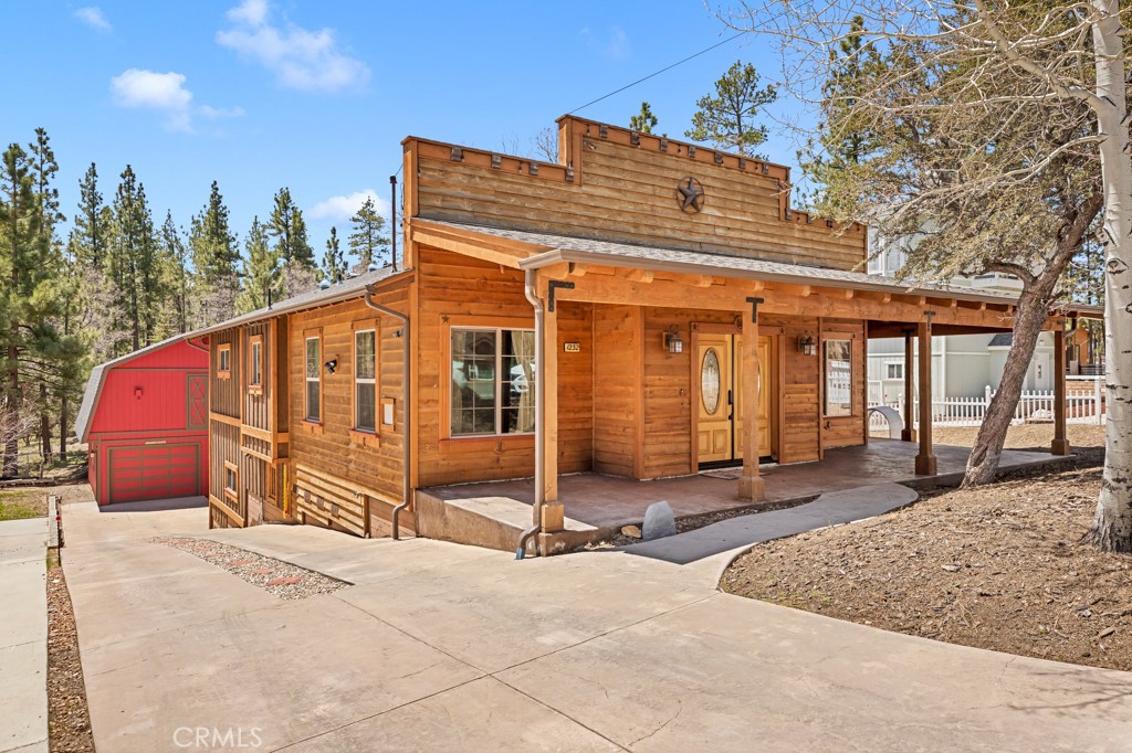 1232 Fox Farm Road Big Bear City, CA 92314 - Photo 1 of 1 a view of a house with backyard and trees