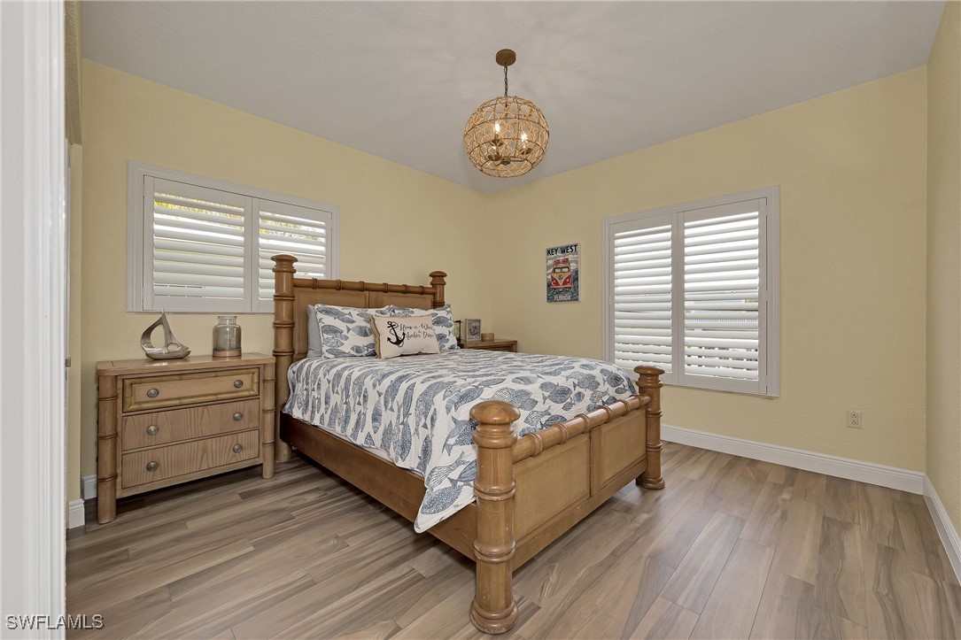 189 Gulfview Drive Islamorada, FL 33036 - Photo 28 of 49 a bedroom with a bed and a window