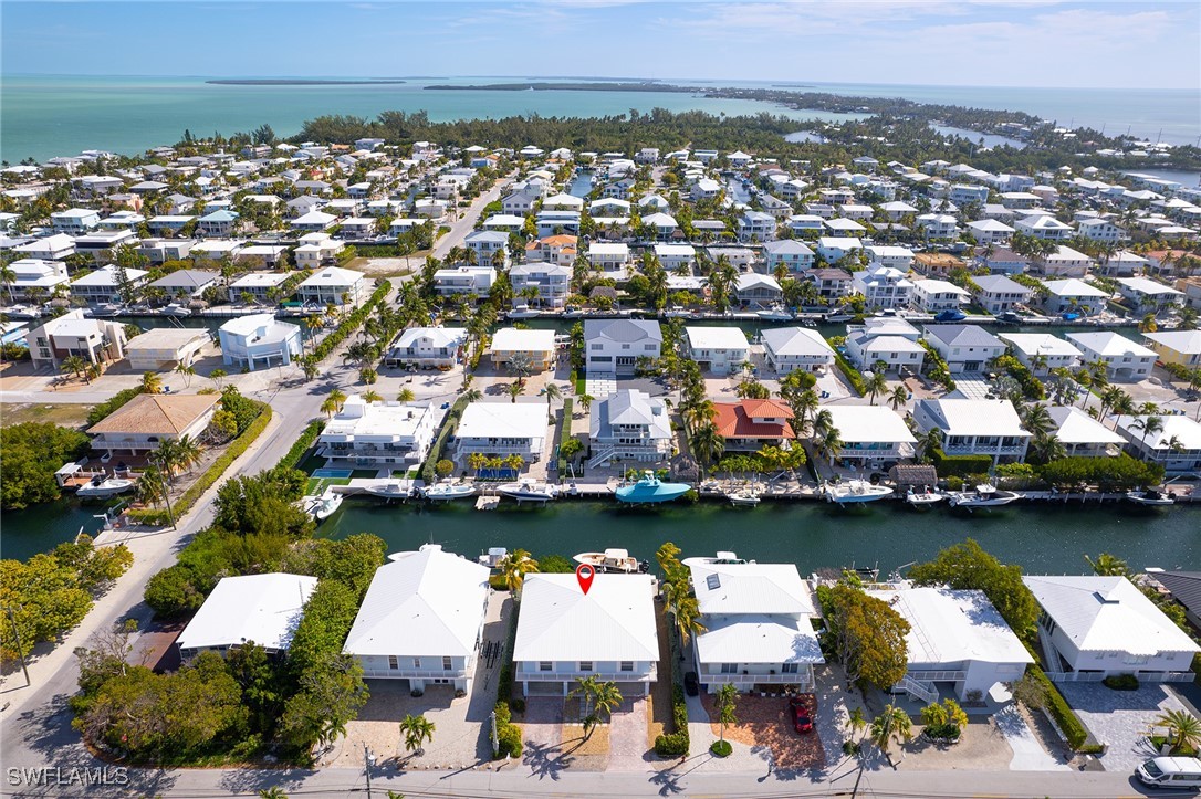 189 Gulfview Drive Islamorada, FL 33036 - Photo 3 of 49 an aerial view of a city with a lake view and boat