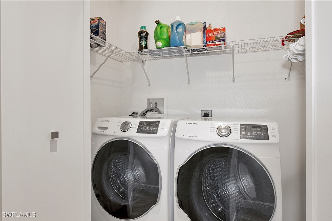 189 Gulfview Drive Islamorada, FL 33036 - Photo 38 of 49 a utility room with dryer and washer