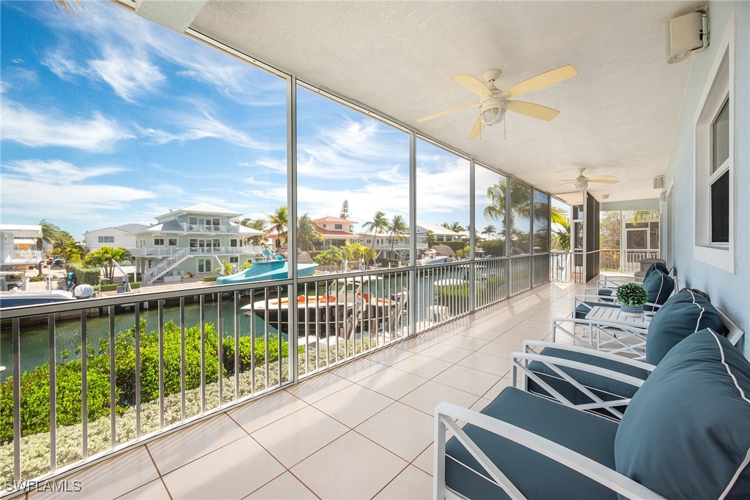 189 Gulfview Drive Islamorada, FL 33036 - Photo 43 of 49 a view of a balcony with lake view and a large window