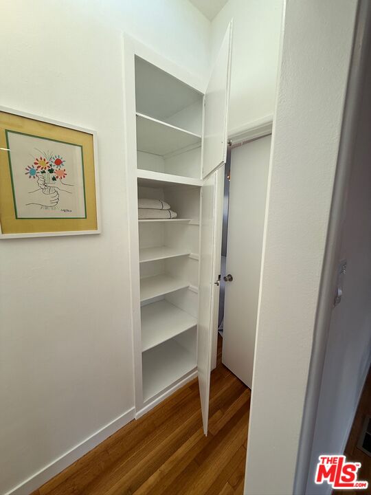 5128 East Wardlow Road Long Beach, CA 90808 - Photo 12 of 35 a view of a hallway with closet