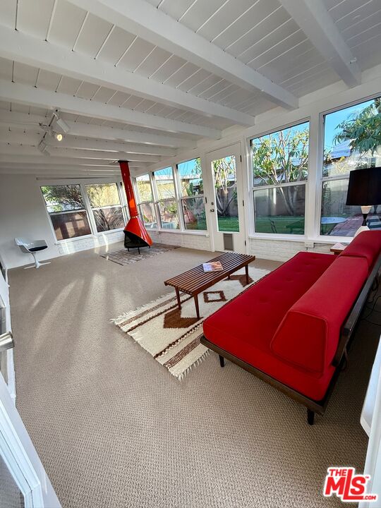 5128 East Wardlow Road Long Beach, CA 90808 - Photo 25 of 35 a room with gym equipment and a large window