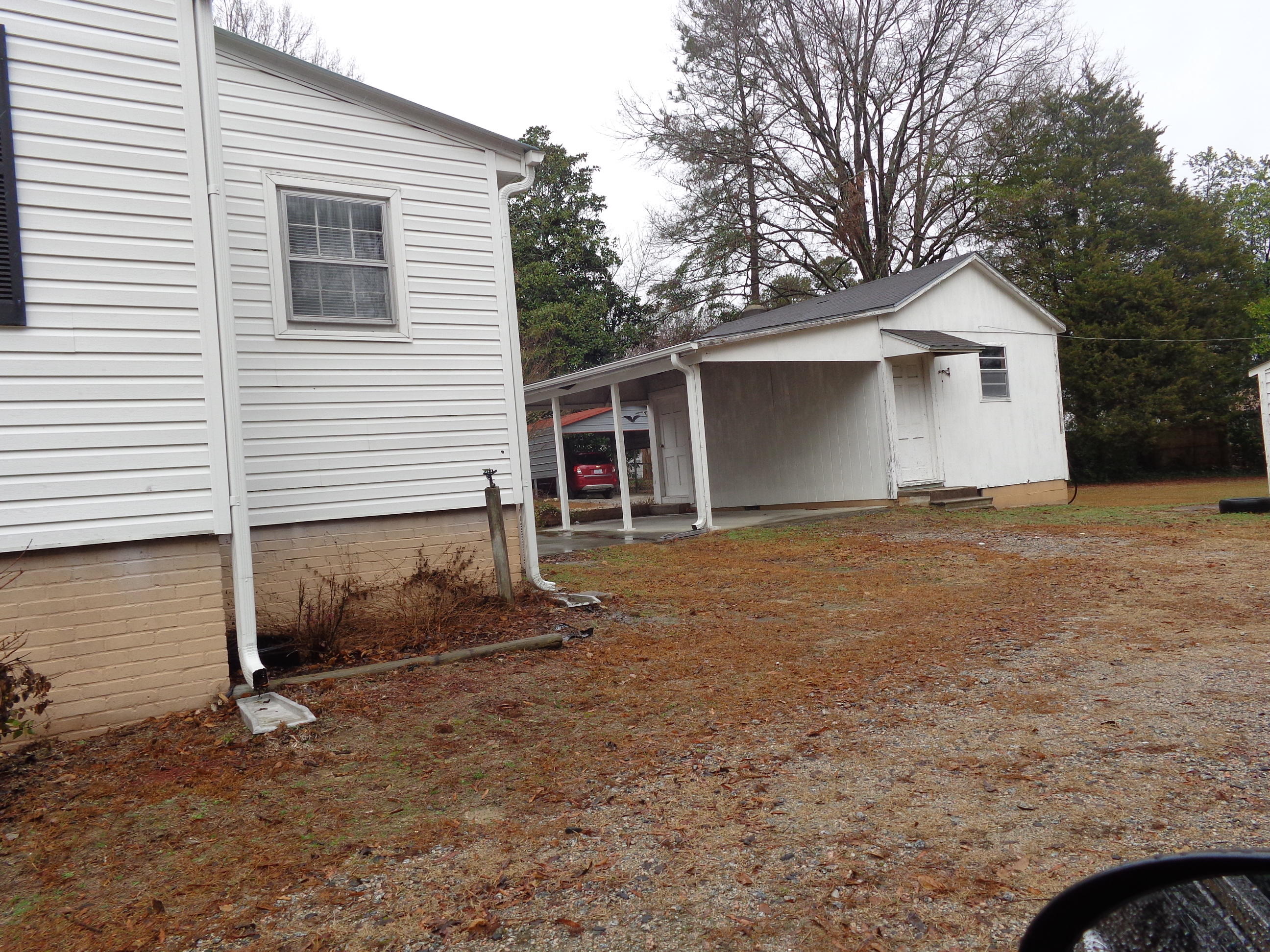 112 North Brookwood Avenue Rockingham, NC 28379 - Photo 13 of 17 Notice the big workshop building in back yard.