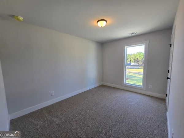 a view of empty room with window
