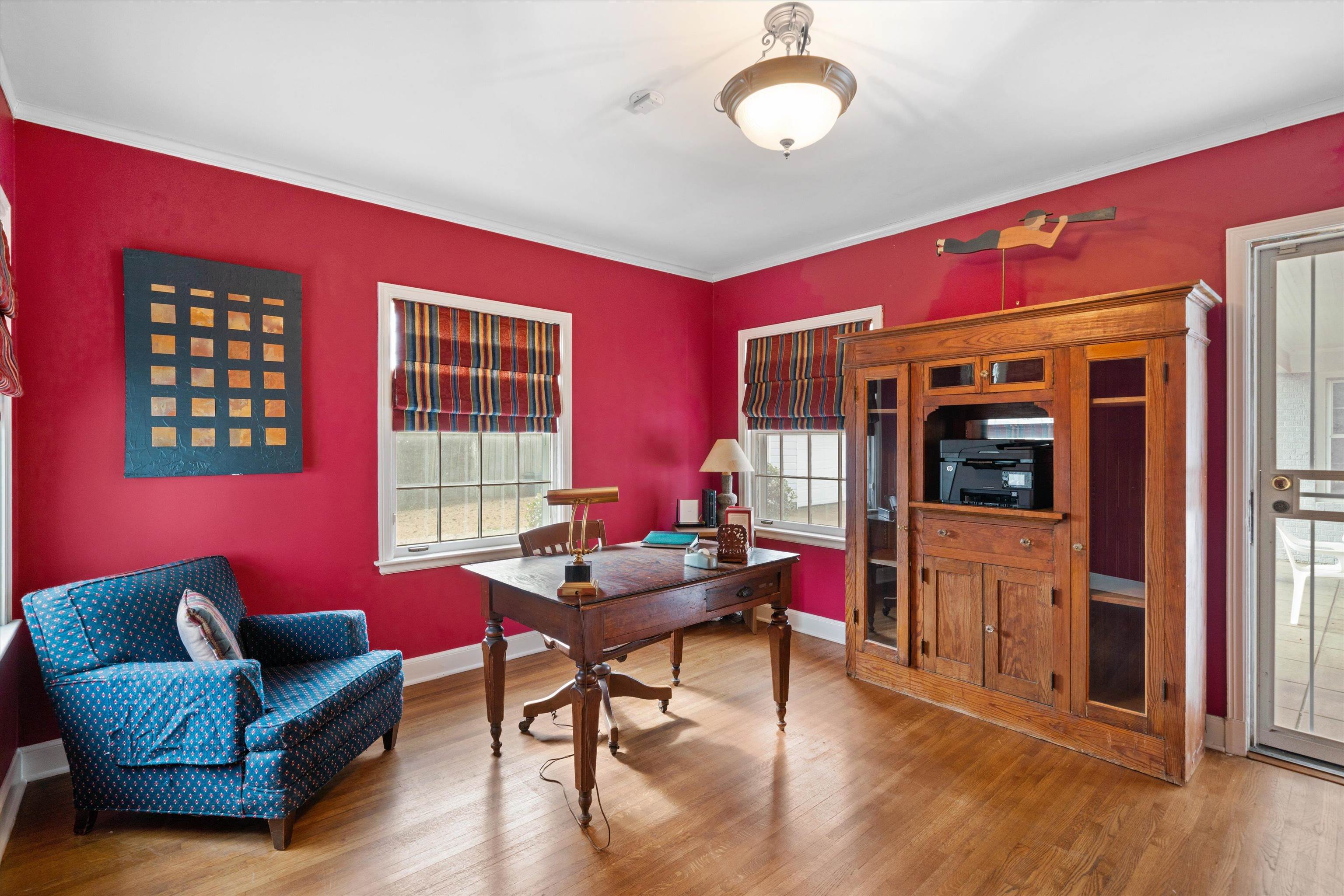 3425 Walnut Grove Road Memphis, TN 38111 - Photo 18 of 25 a living room with furniture and a flat screen tv