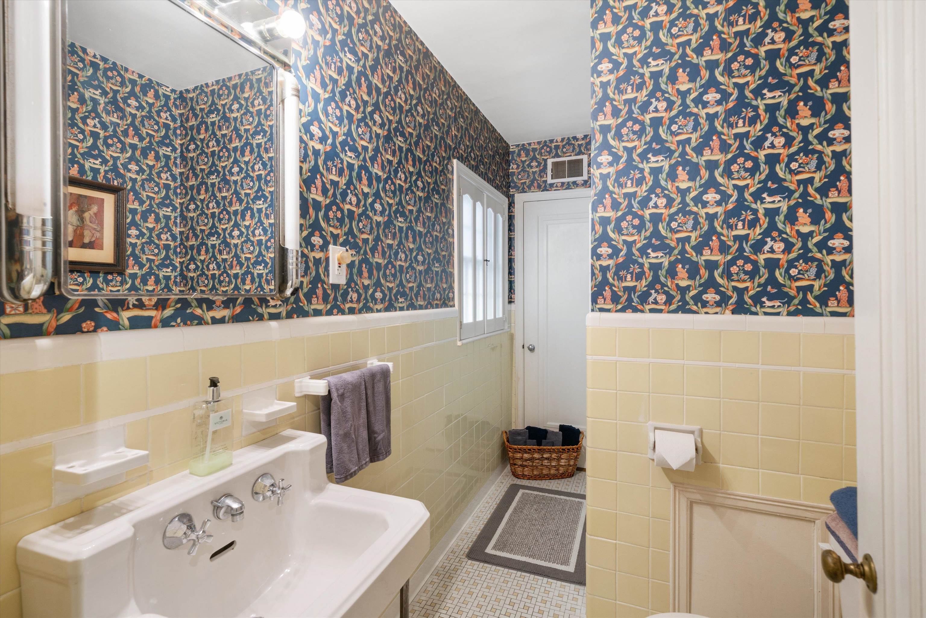 3425 Walnut Grove Road Memphis, TN 38111 - Photo 20 of 25 a bathroom with a sink and a mirror