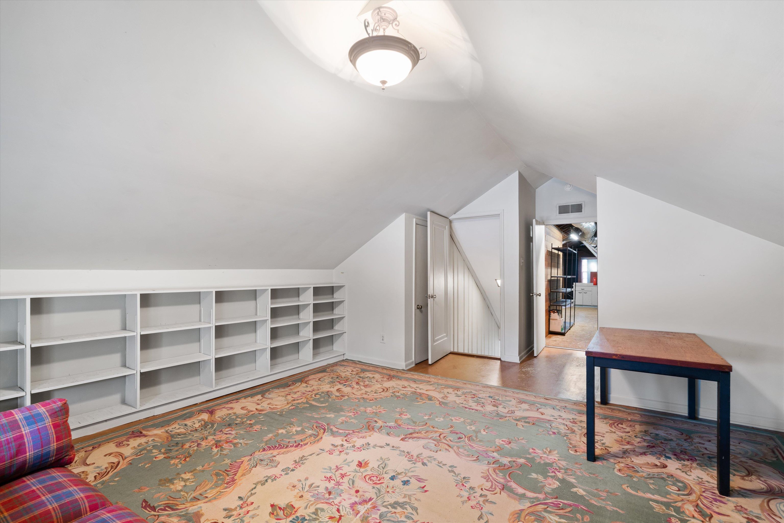 3425 Walnut Grove Road Memphis, TN 38111 - Photo 23 of 25 a view of a livingroom with furniture and staircase