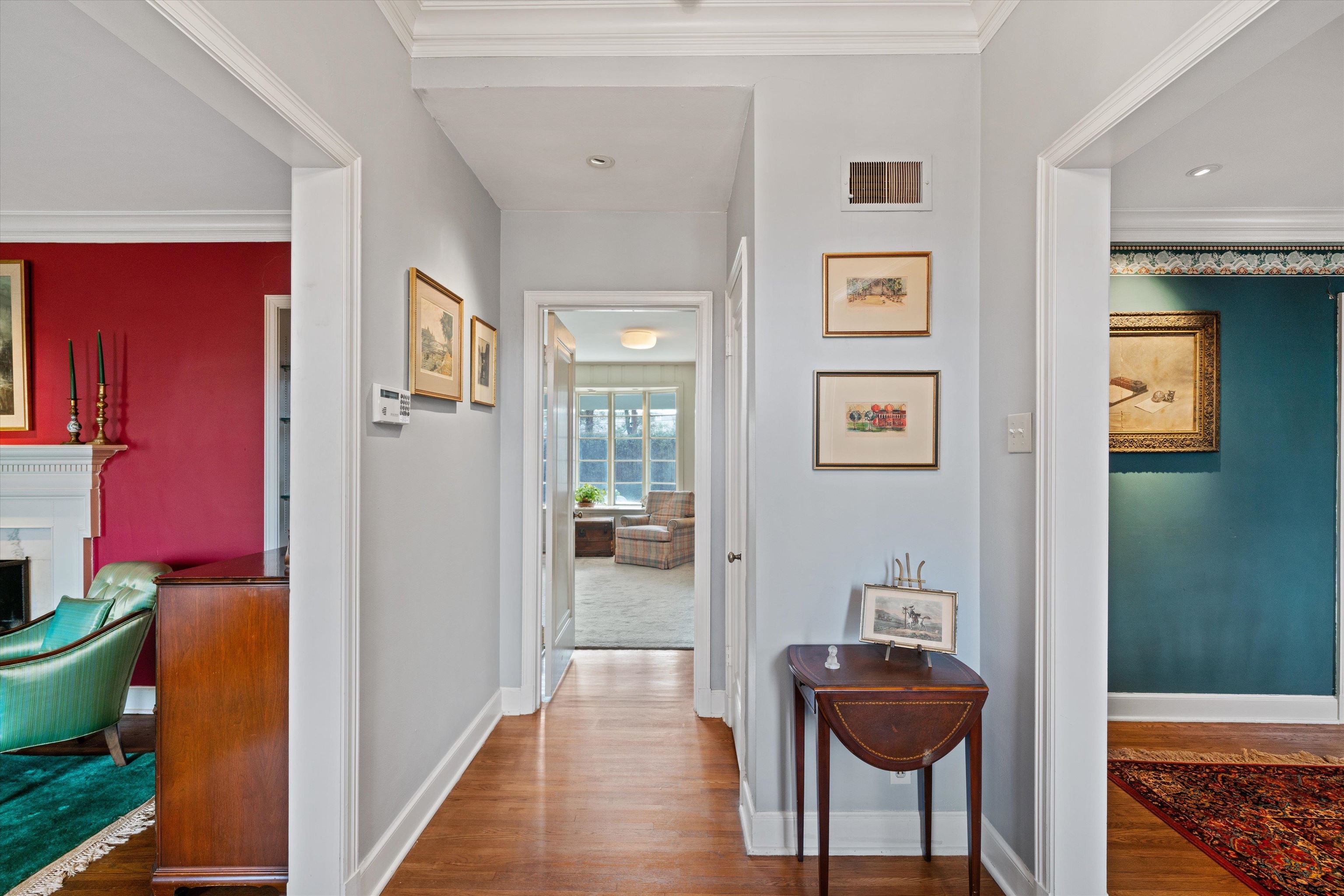 3425 Walnut Grove Road Memphis, TN 38111 - Photo 3 of 25 a view of hall way with furniture and wooden floor