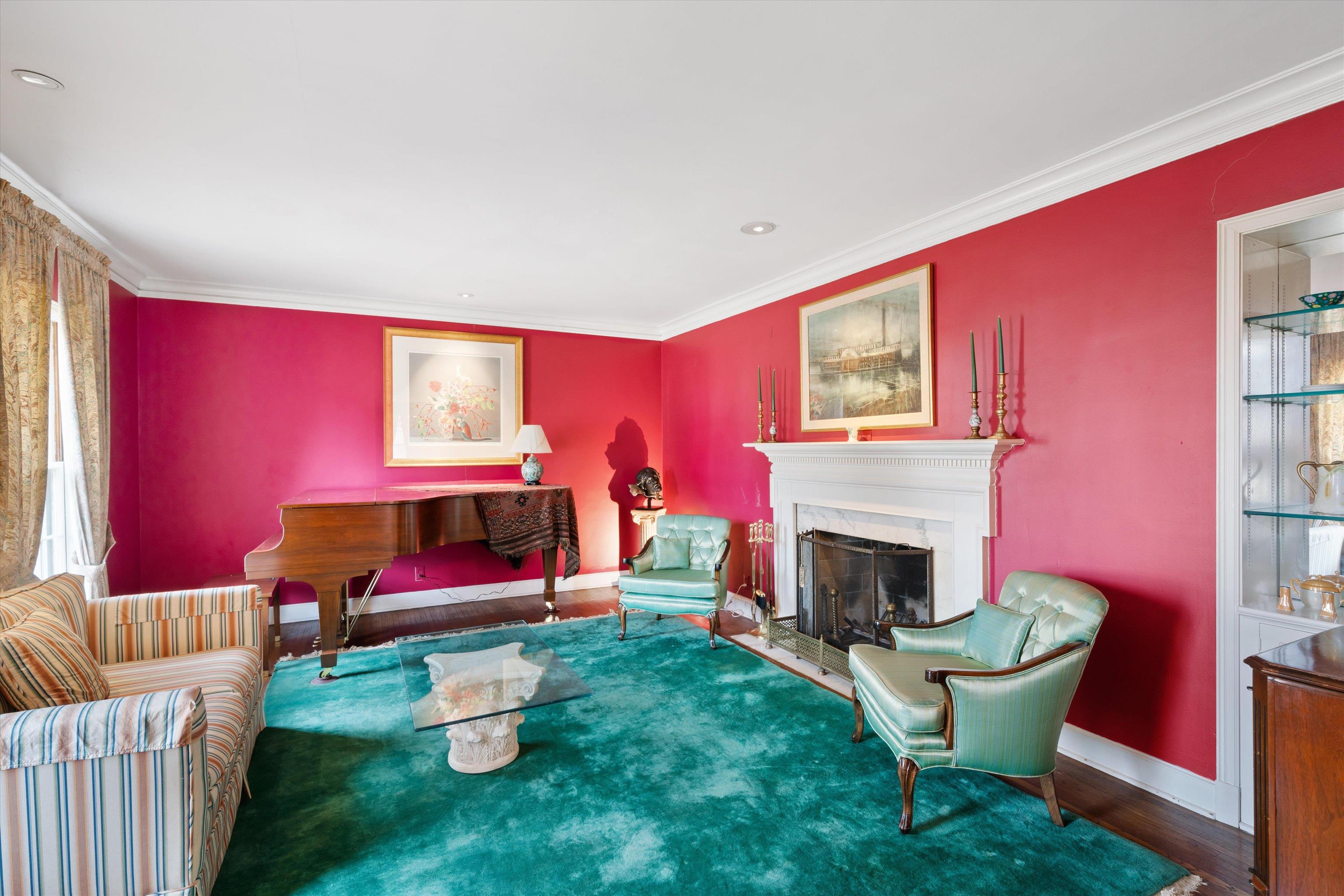 3425 Walnut Grove Road Memphis, TN 38111 - Photo 5 of 25 a living room with furniture and a fireplace