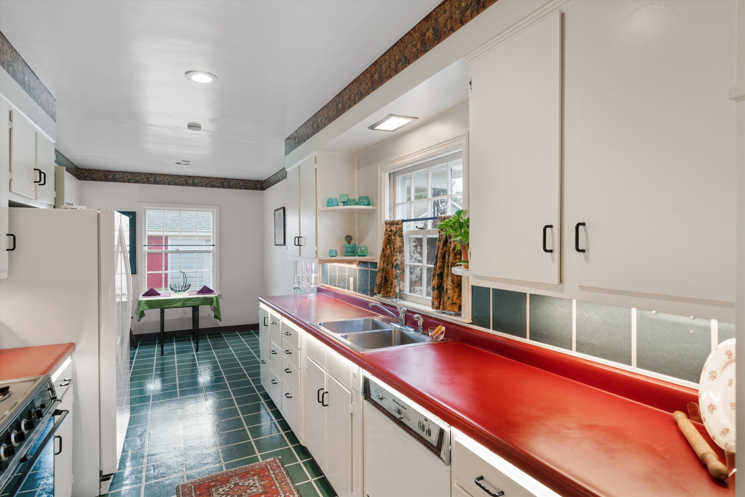 3425 Walnut Grove Road Memphis, TN 38111 - Photo 8 of 25 a room with stainless steel appliances kitchen island granite countertop a sink and cabinets