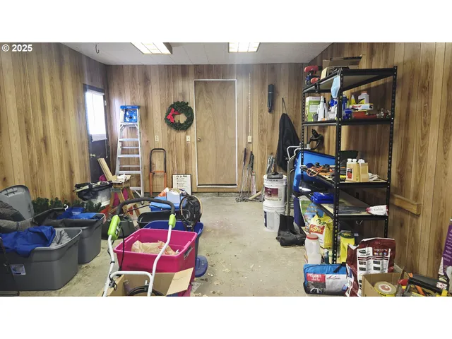 a kitchen with furniture and a fireplace