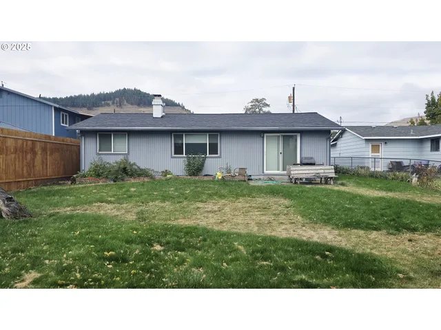 a black and white photo of a house