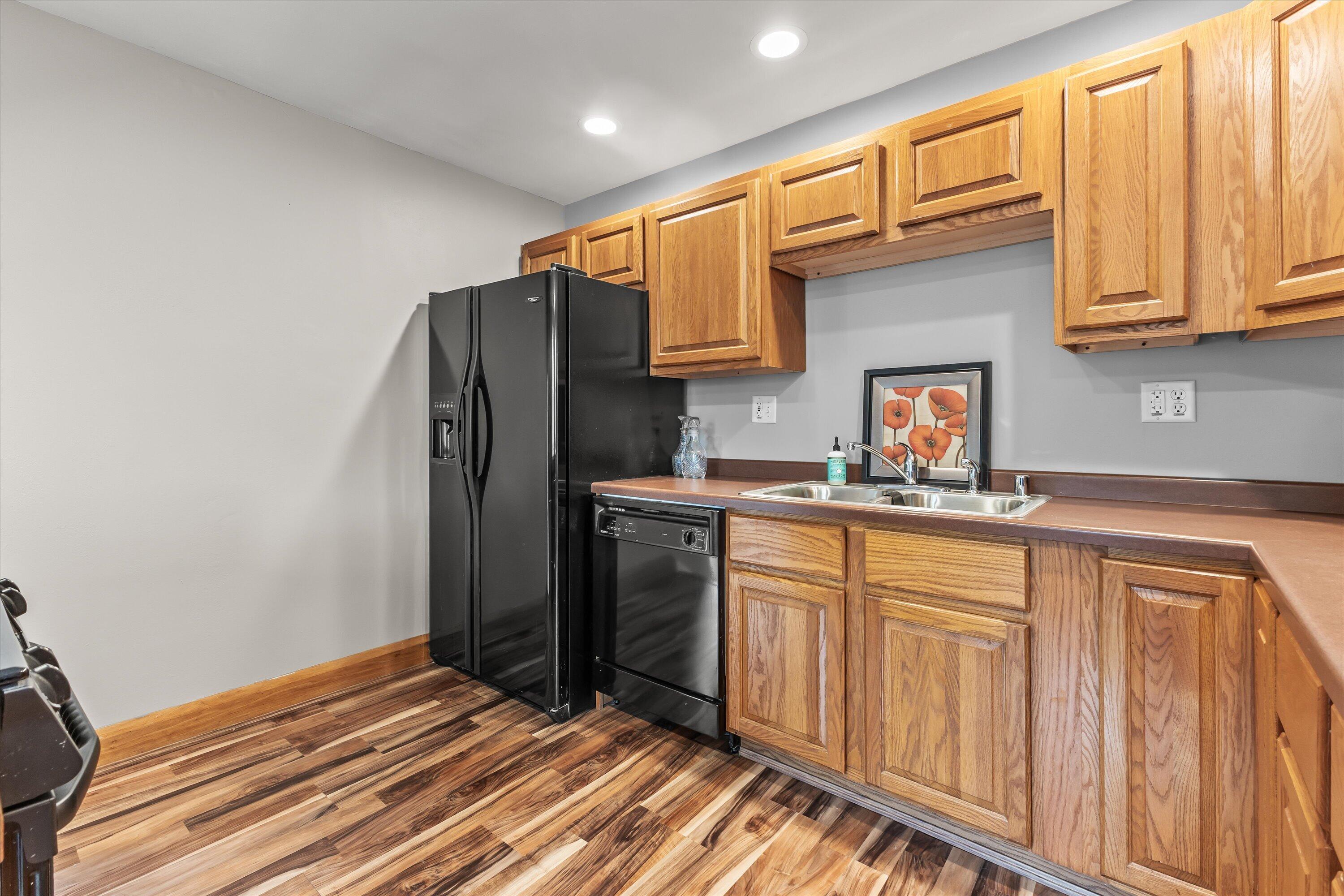 2925 North Main Street Racine, WI 53402 - Photo 23 of 23 Designed for everyday living, the kitchen offers abundant cabinetry, generous prep space, breakfast bar seating, and an open connection to the adjoining dining area.