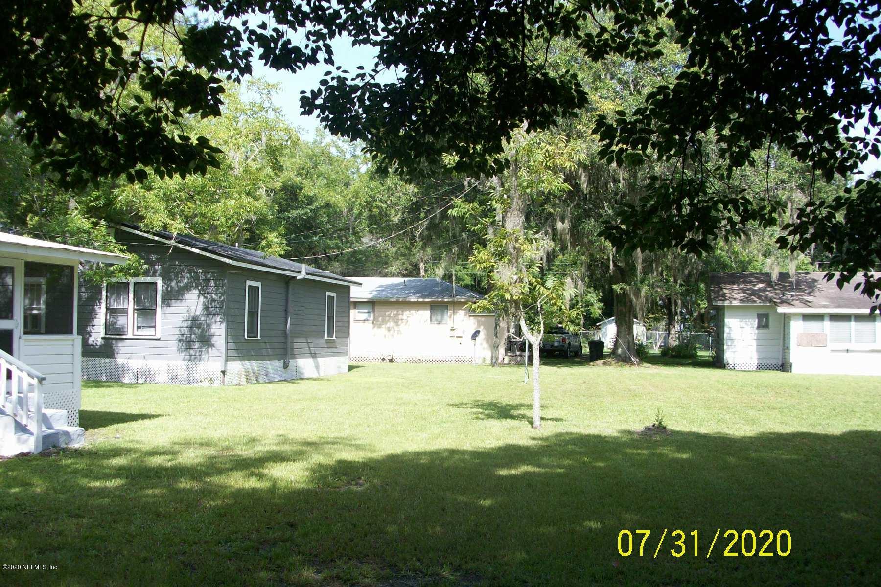 524 St Clair Street Starke, FL 32091 - Photo 13 of 20 a view of a house with a yard