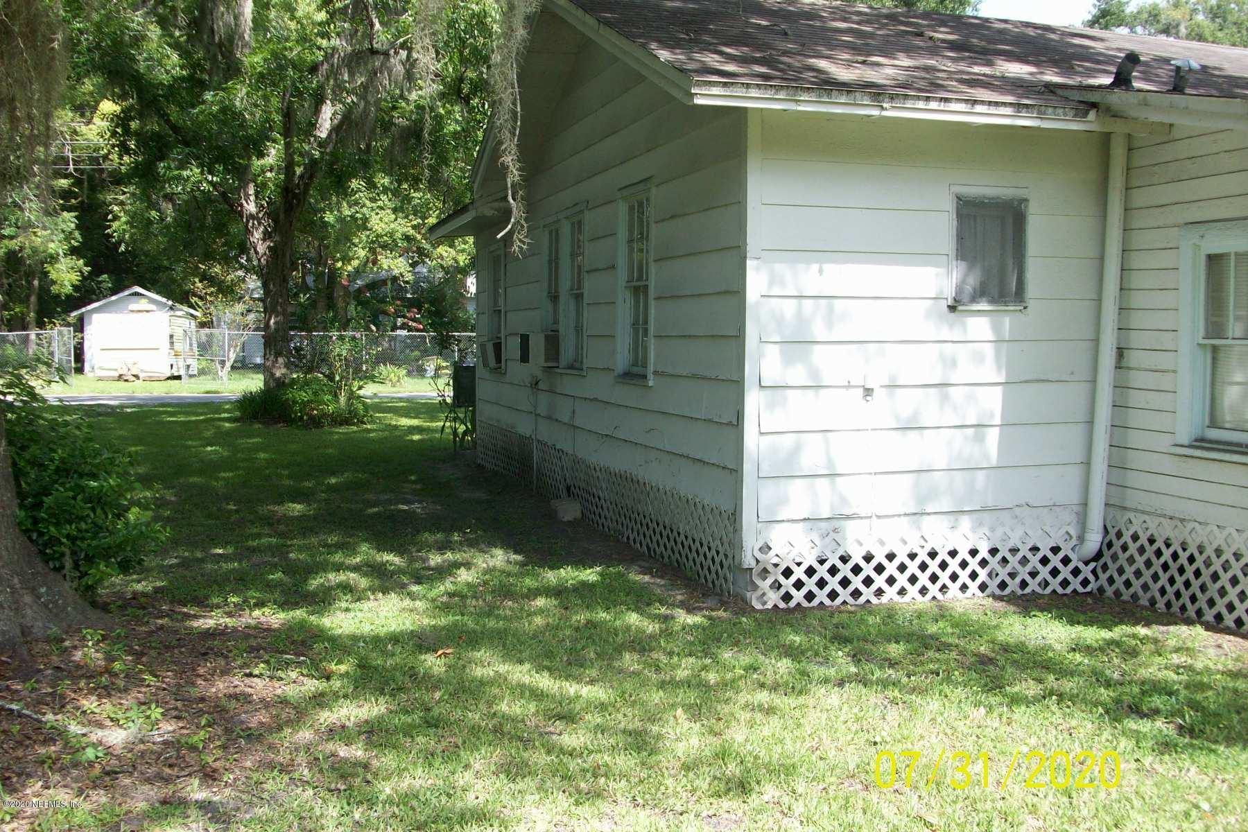 524 St Clair Street Starke, FL 32091 - Photo 17 of 20 a backyard of a house with lots of green space