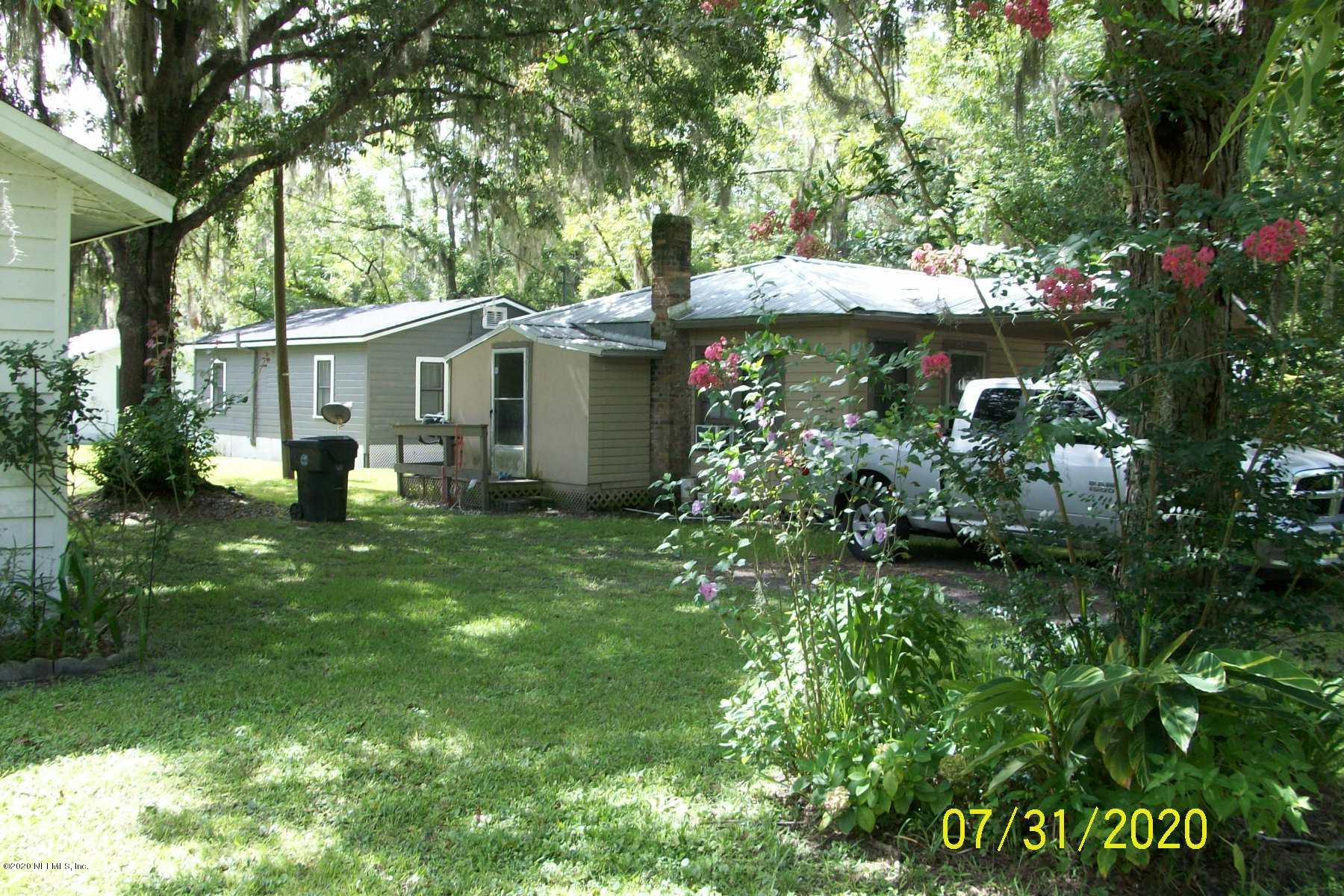 524 St Clair Street Starke, FL 32091 - Photo 20 of 20 a view of a house with a garden