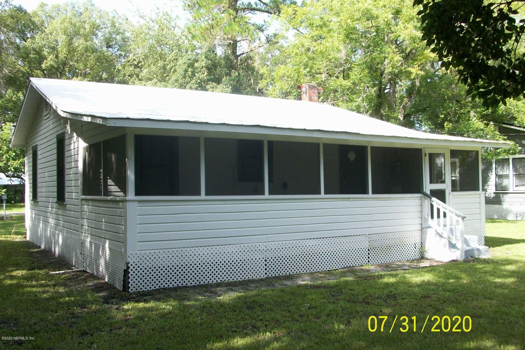 524 St Clair Street Starke, FL 32091 - Photo 3 of 20 a view of house with backyard