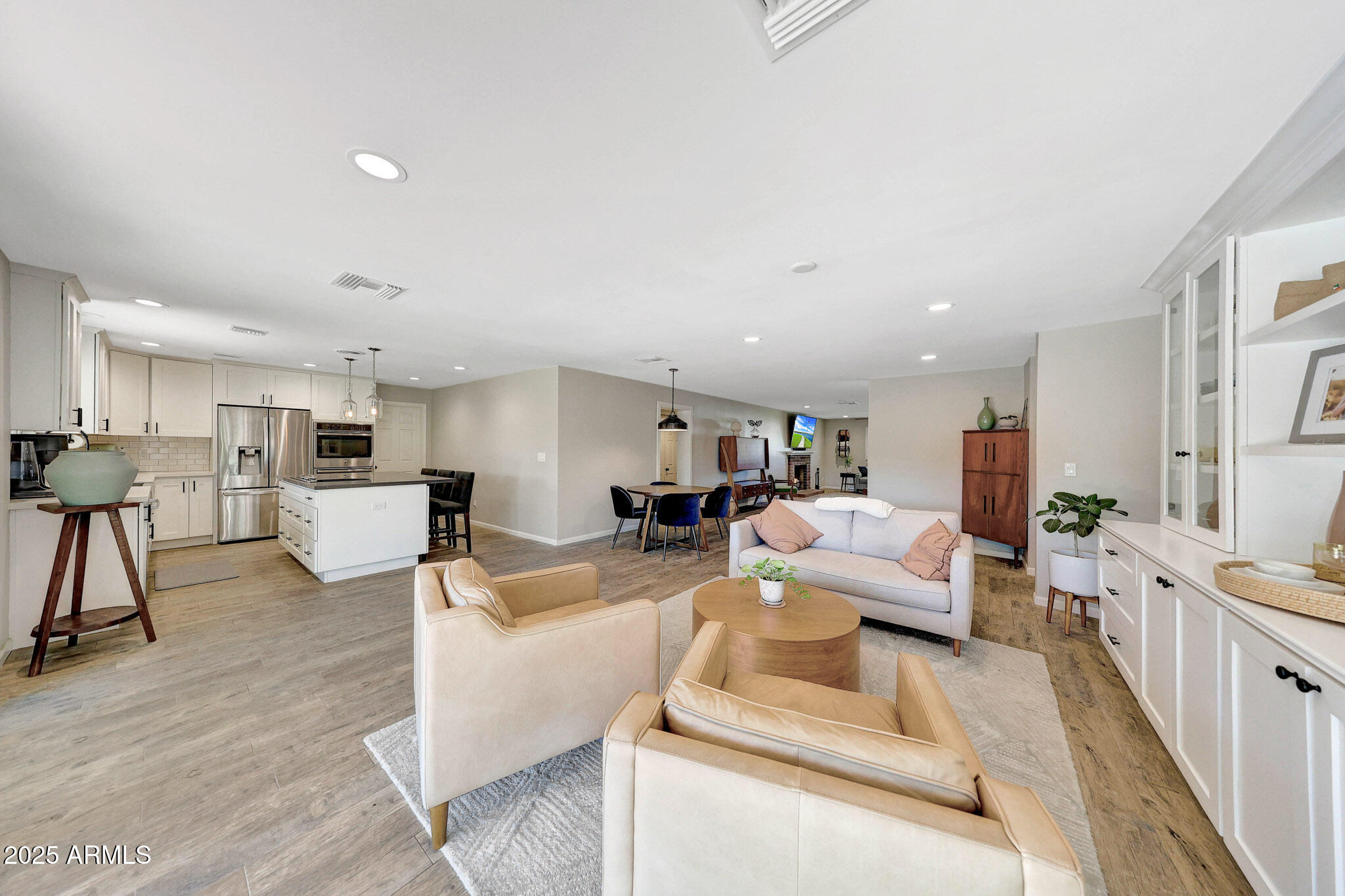 805 West Northview Avenue Phoenix, AZ 85021 - Photo 15 of 51 a living room with furniture and a wooden floor