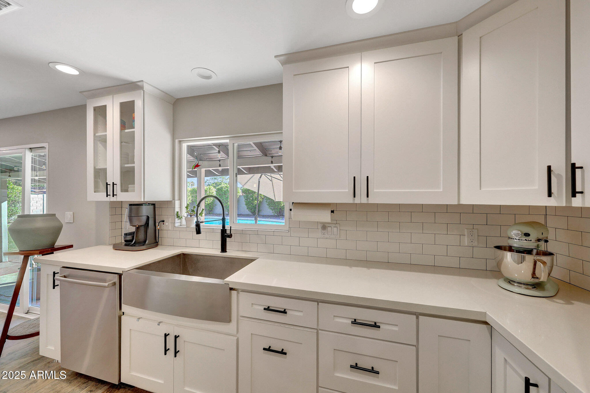 805 West Northview Avenue Phoenix, AZ 85021 - Photo 18 of 51 a kitchen with cabinets appliances a sink and a window