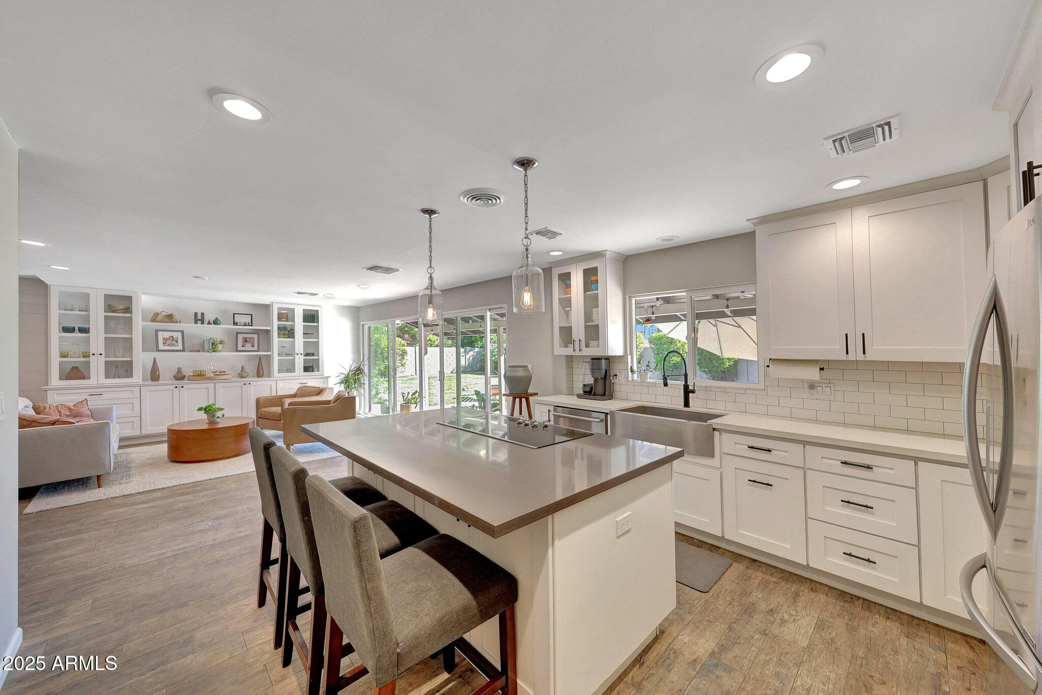 805 West Northview Avenue Phoenix, AZ 85021 - Photo 19 of 51 a kitchen with a table chairs and wooden floor