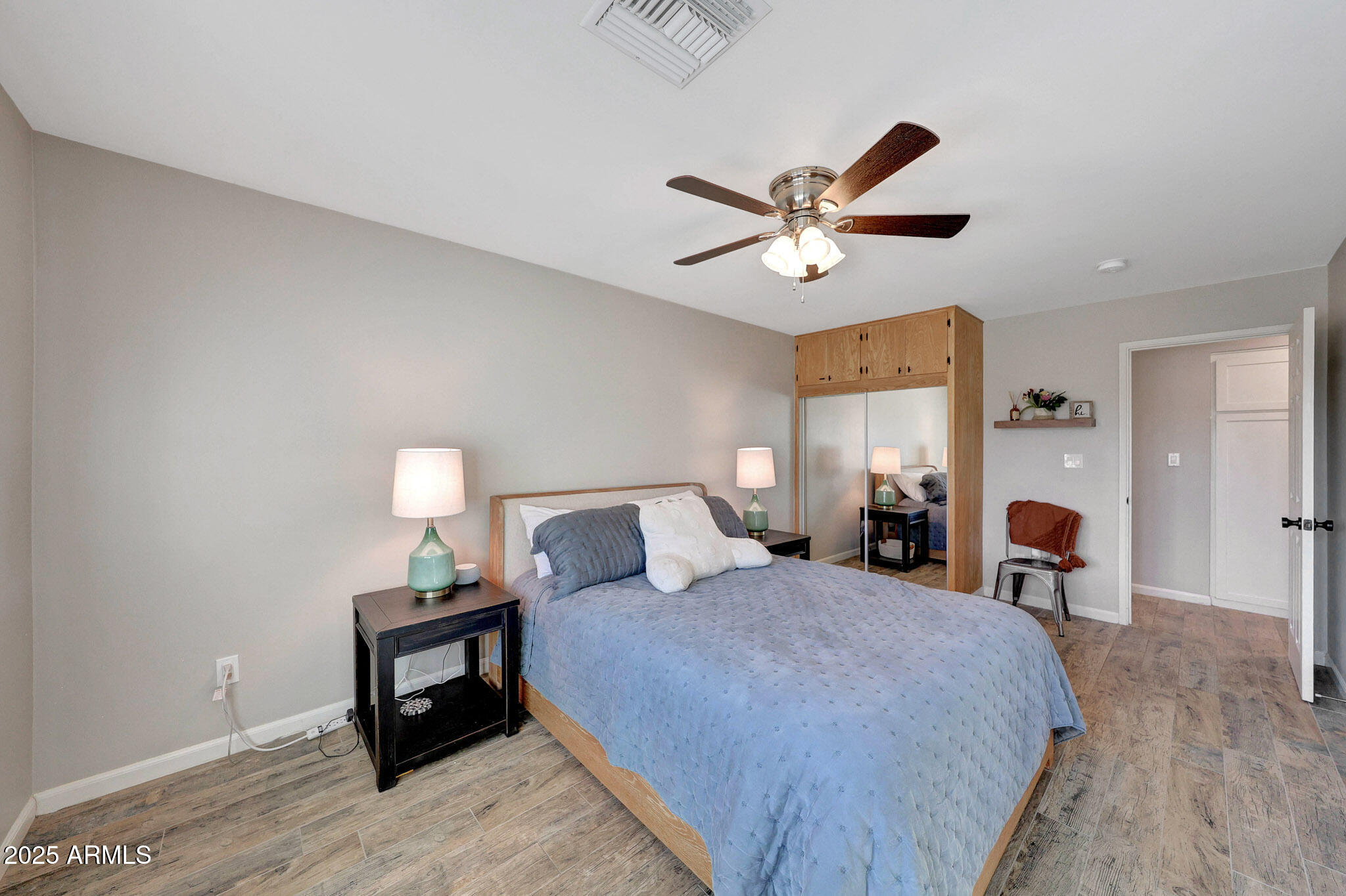 805 West Northview Avenue Phoenix, AZ 85021 - Photo 21 of 51 a bedroom with bed and a chandelier