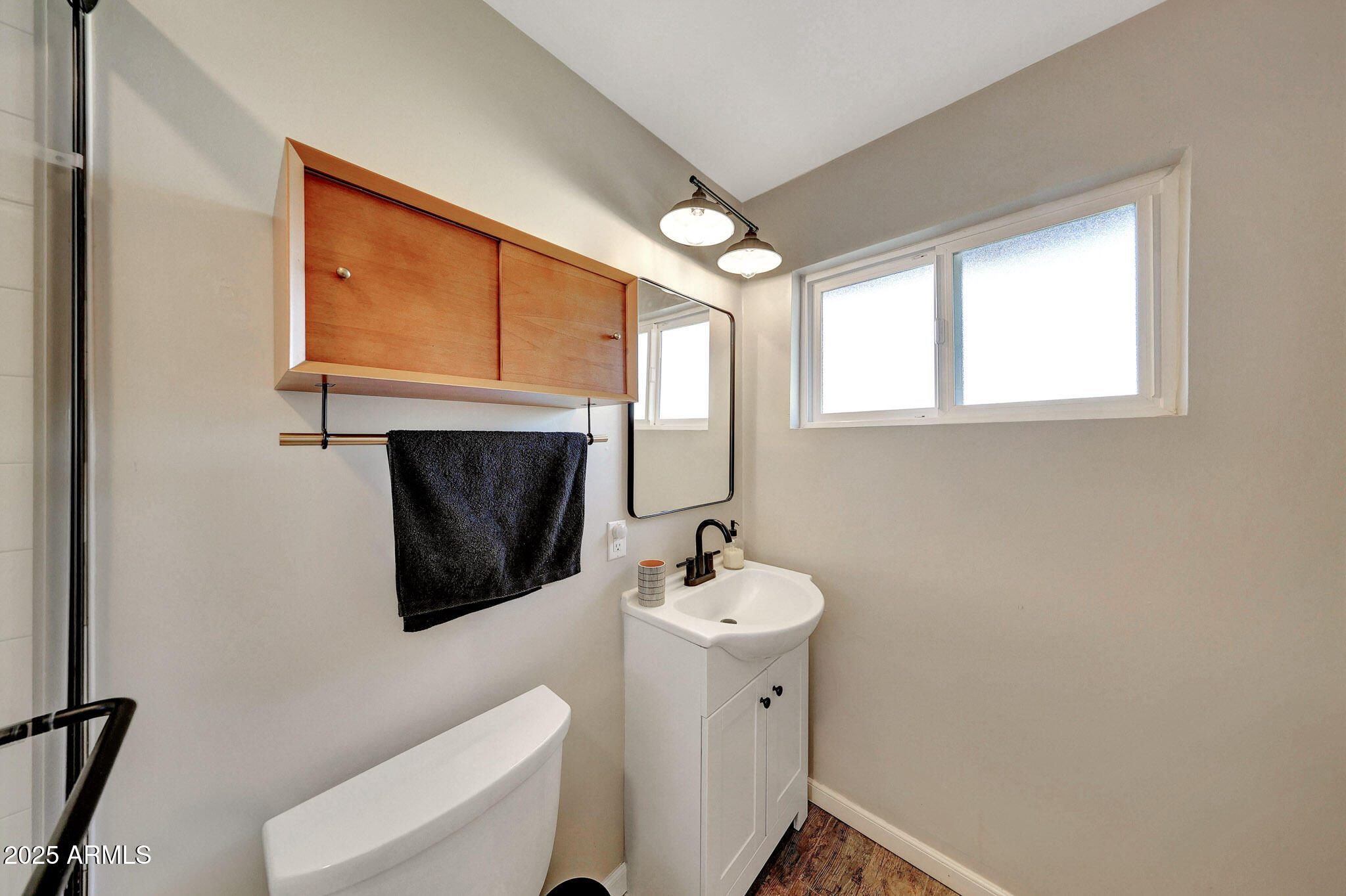 805 West Northview Avenue Phoenix, AZ 85021 - Photo 26 of 51 a bathroom with a sink mirror and toilet