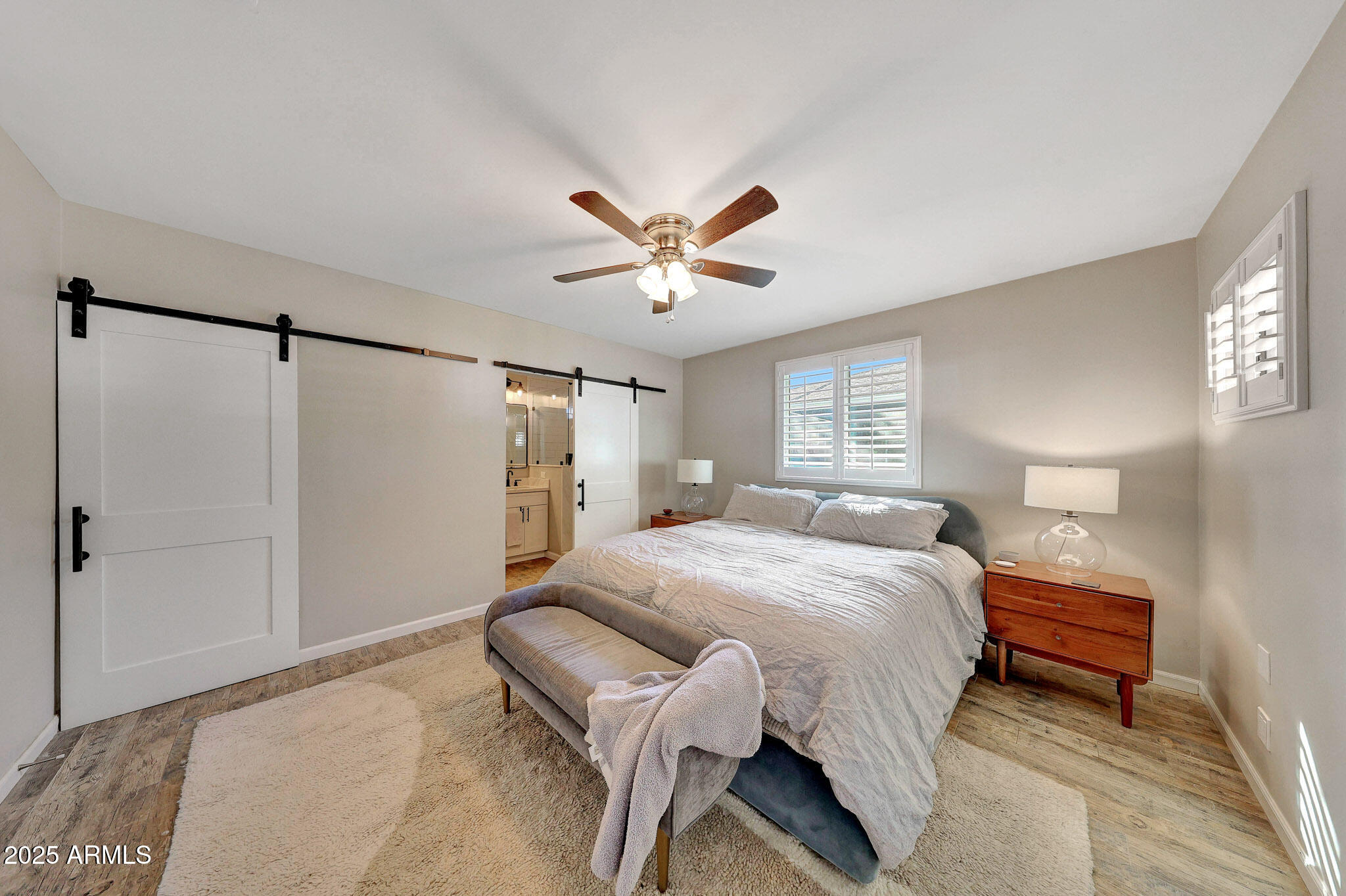 805 West Northview Avenue Phoenix, AZ 85021 - Photo 30 of 51 a bedroom with a bed and a ceiling fan