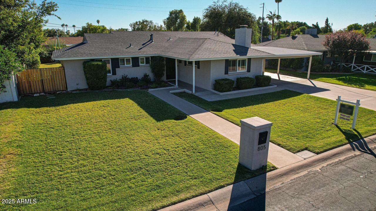 805 West Northview Avenue Phoenix, AZ 85021 - Photo 51 of 51 a front view of a house with garden