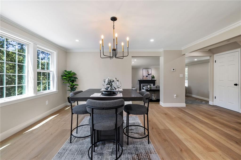 8241 Thompson Run Road Pittsburgh, PA 15237 - Photo 13 of 47 a view of a dining room with furniture window and wooden floor