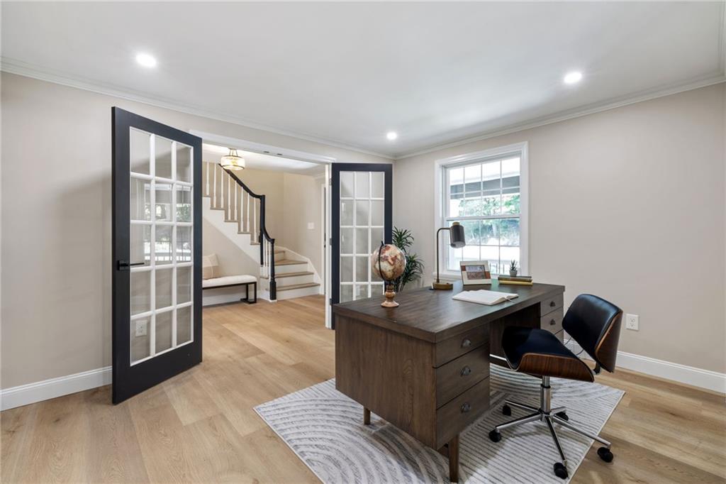 8241 Thompson Run Road Pittsburgh, PA 15237 - Photo 24 of 47 a view of a workspace with furniture and a window