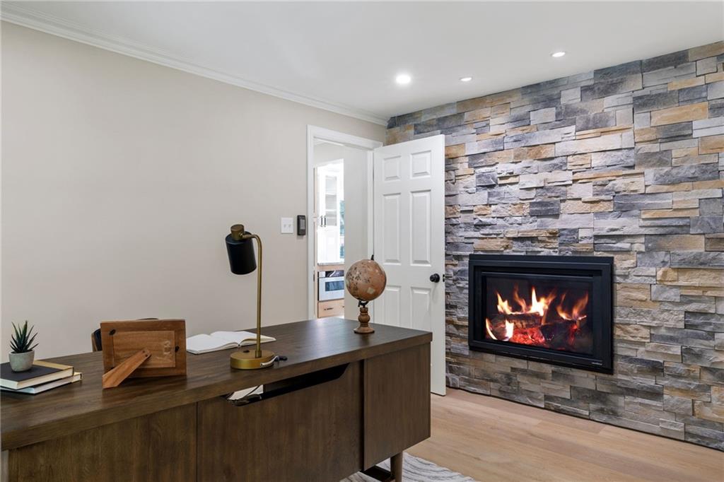 8241 Thompson Run Road Pittsburgh, PA 15237 - Photo 26 of 47 a living room with furniture and a fireplace
