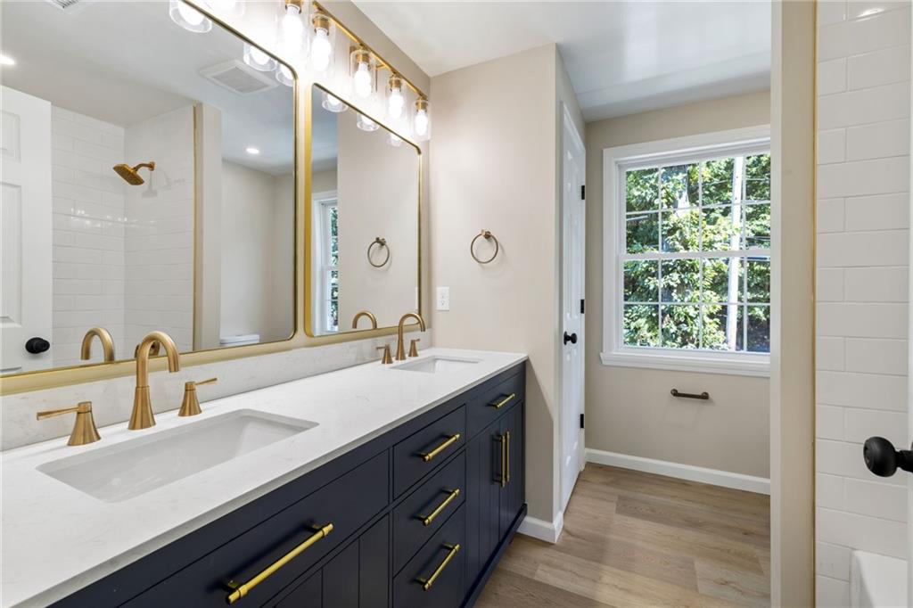 8241 Thompson Run Road Pittsburgh, PA 15237 - Photo 33 of 47 a bathroom with a sink and a mirror