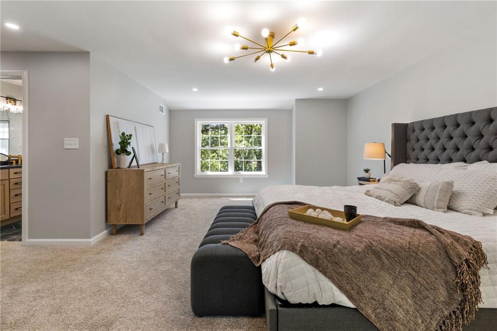 8241 Thompson Run Road Pittsburgh, PA 15237 - Photo 39 of 47 a bedroom with a bed and window