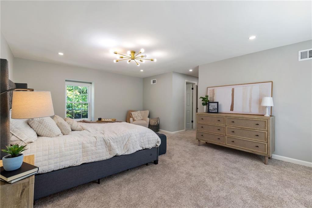 8241 Thompson Run Road Pittsburgh, PA 15237 - Photo 40 of 47 a bedroom with a bed and window