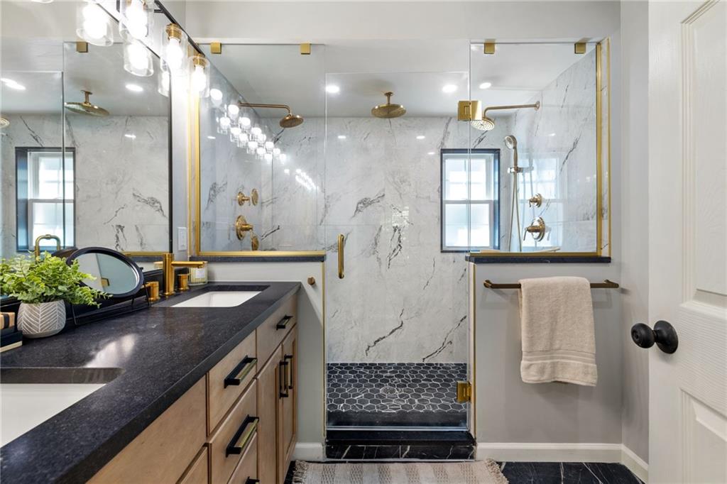 8241 Thompson Run Road Pittsburgh, PA 15237 - Photo 41 of 47 a bathroom with sink shower and mirror