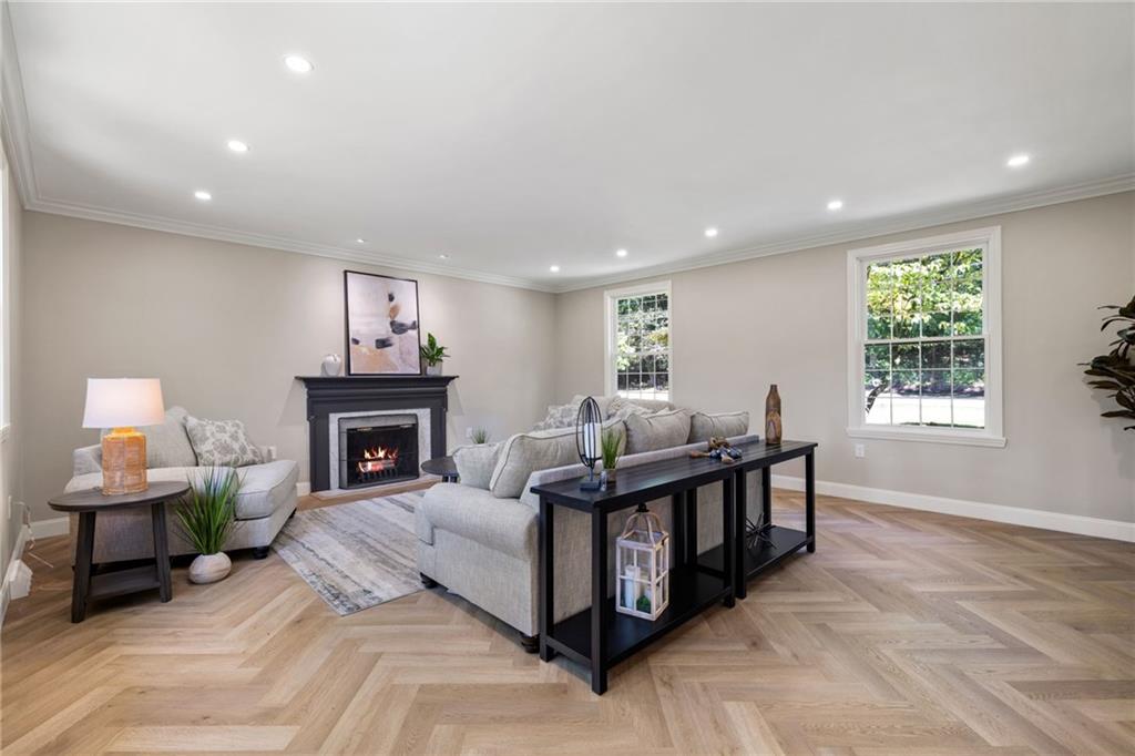 8241 Thompson Run Road Pittsburgh, PA 15237 - Photo 6 of 47 a living room with furniture and a fireplace