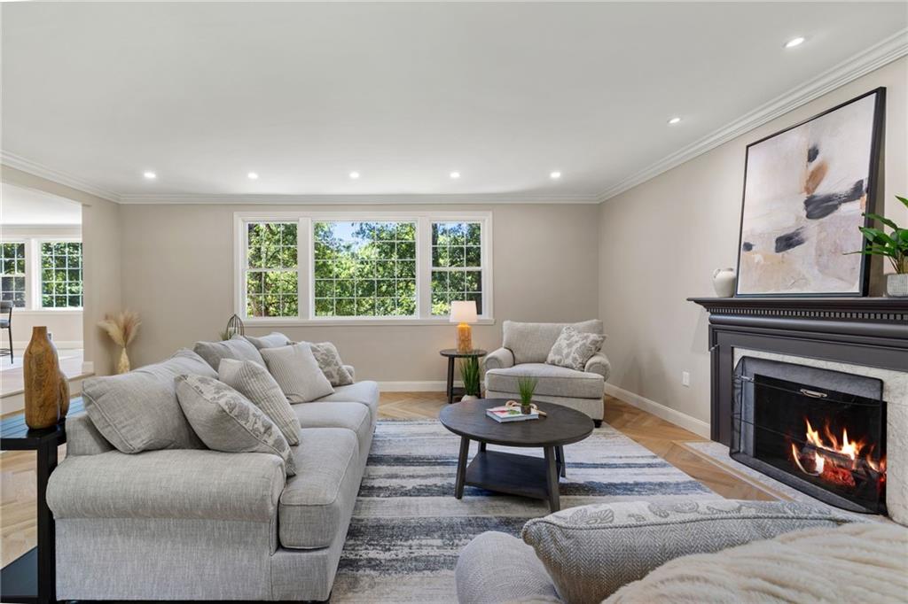 8241 Thompson Run Road Pittsburgh, PA 15237 - Photo 8 of 47 a living room with furniture and a fireplace