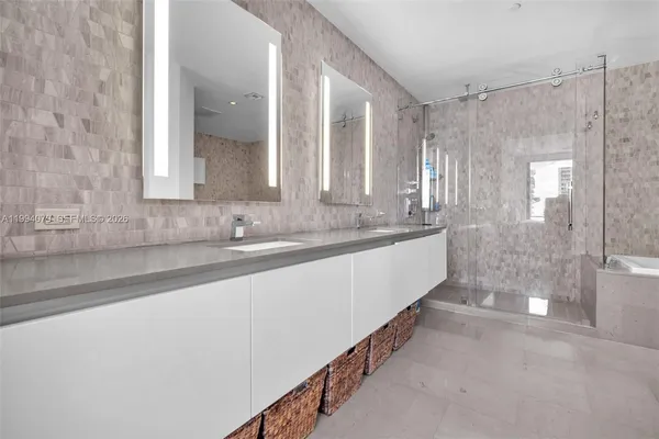 a view of a city with tall buildings