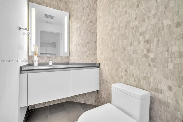 a view of entryway with washer and dryer