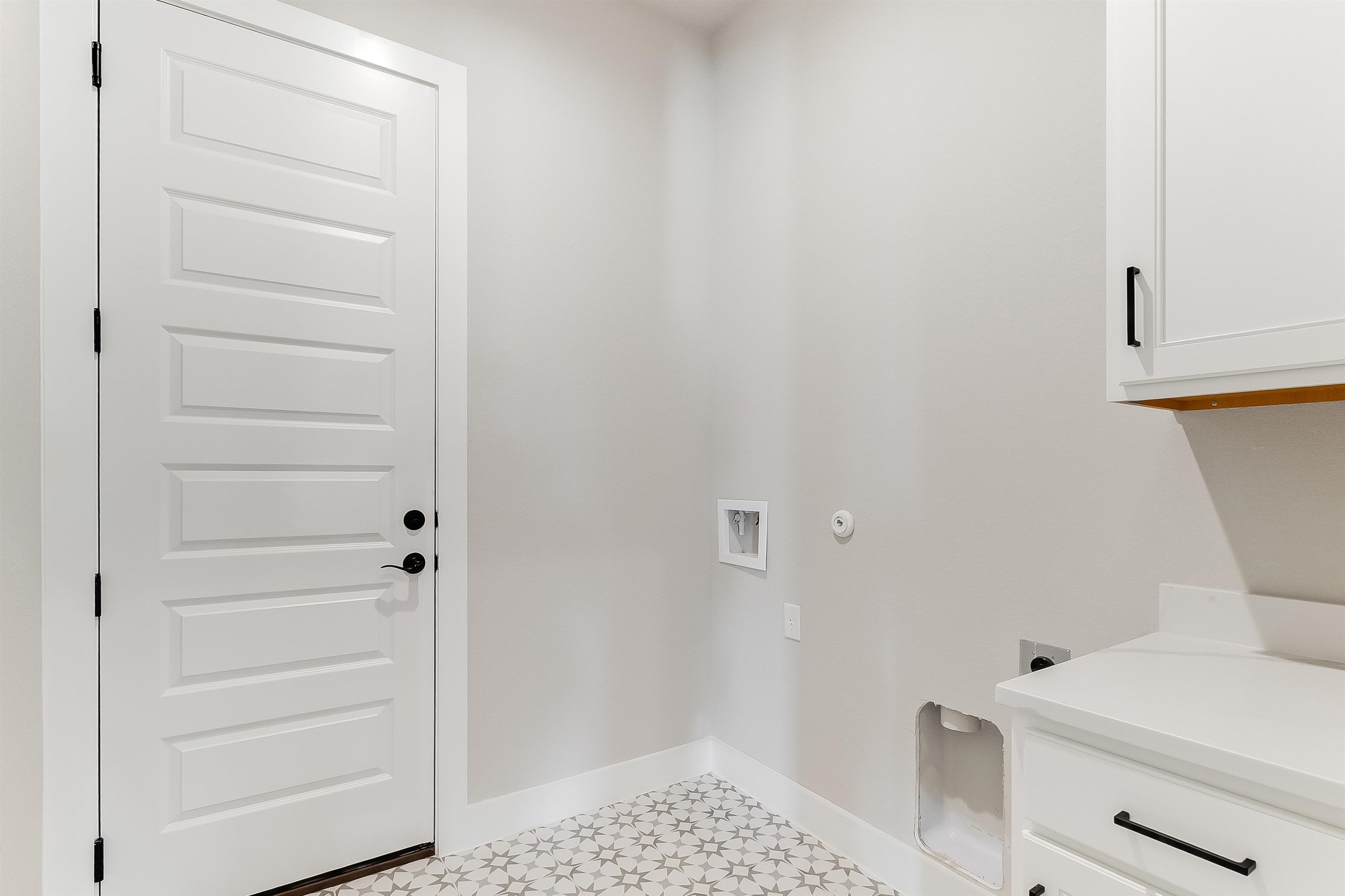 124 Draper Lane Bertram, TX 78605 - Photo 19 of 30 a bathroom with a sink and a toilet