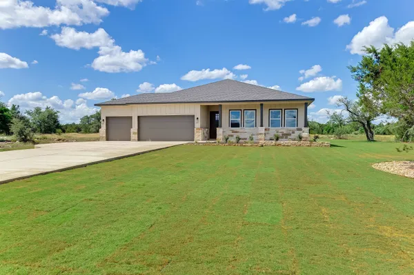 a house view with a garden space