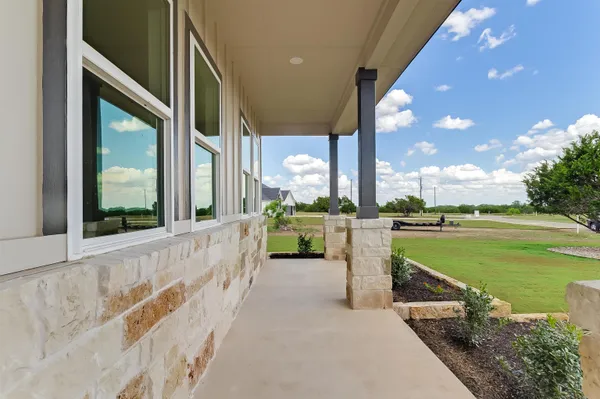 a view of a balcony with lake view